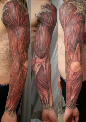 arm sleeve tattoo. Arm muscles. Brain tattoo